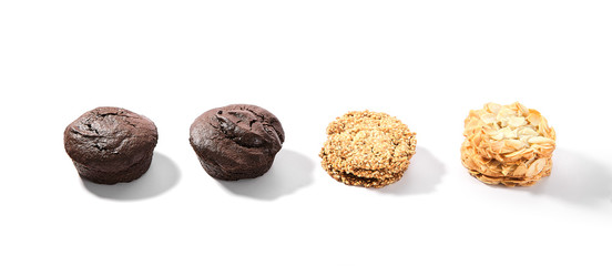Fototapeta na wymiar Chocolate Cupcakes, Almond Cookie and Sesame Cookies
