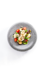 Salad with cheese profiteroles and sous vide chicken