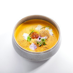 Pumpkin soup in bowl