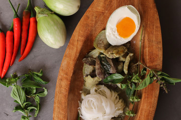 Thai Food Spicy Green Curry Chicken and Organic Vegetable, Chili and Herbs Come with Rice Noodles, Salted Egg. Homemade Asian Culinary.