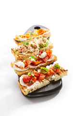 Bruschettas with seafood and vegetables