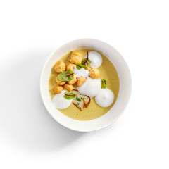 Wild mushroom cream soup with cheese profiteroles