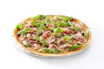 Pizza with Dried Tomatoes, Capers, Prosciutto, Arugula and Mozzarella