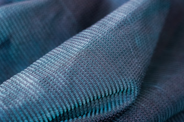 Shade net with detailed texture in selective focus. Used in gardening, nurseries, agriculture....