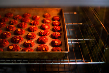Red velvet cookies baked in an oven