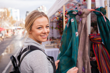 Fototapeta na wymiar Happy Shopper at the Outdoor Market