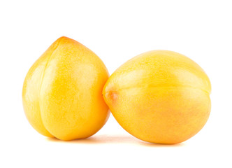 Fresh yellow peach isolated on white background.