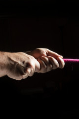 Hands with a rope
