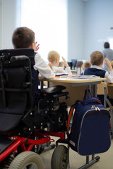 A disabled student in a wheelchair in primary school.