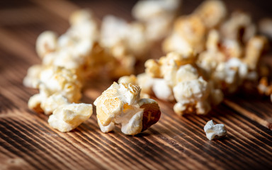 Popcorn flakes on a wooden background
