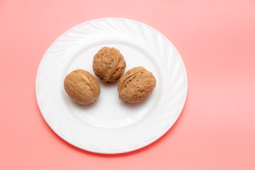Walnuts in a white plate