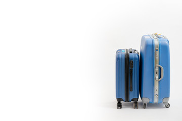 Two blue suitcase isolated on white background. Blue suitcase.