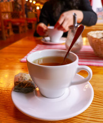 Black tea in a glass on the table