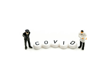 Fototapeta premium Miniature people : coronavirus covid 19 infected patient caution outbreak alert.