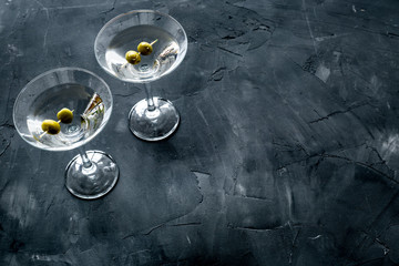 Fototapeta premium Martini with olives on grey background copy space