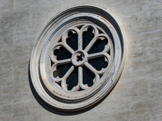 medieval rose window in a church in Piazza navona, Rome, Italy