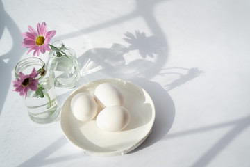 Eggs and flowers in spring postcard for Easter or birthday greetings