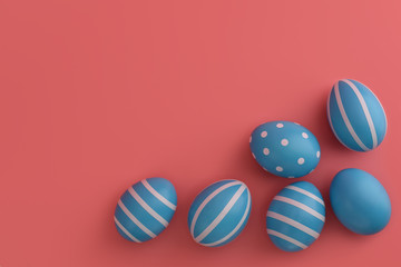 Corner border of blue Easter decorated eggs on a pink background. White stripes and circles on handmade coloured eggs. Happy Easter card. Top view, flat lay, copy space. 
