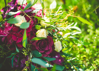  bright bouquet of red and white roses with green accents