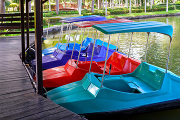 Fototapeta na wymiar Colorful Pedal Boats in the City Park