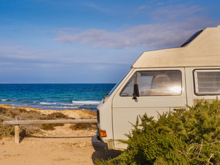 Camper van on beach, camping on nature