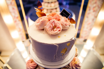 delicious cake decorated with pink peonies