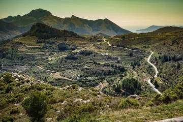 Gordijnen bergen landschap en uitzicht op de kust, Spanje © Voyagerix