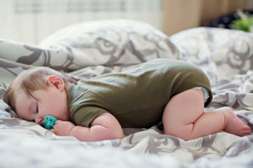 Sleeping baby with pacifier