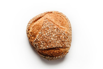 A loaf of homemade oat bread shot from above