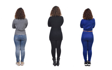 the same woman with casual elegant clothes and sportswear,arms crossed rear view