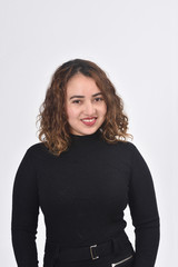 portrait of a woman with brown hair smiling on white background