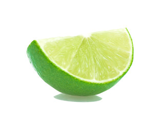 Limes with slices isolated on white background