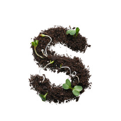 Letter of the English alphabet isolated on white background. The stencil is created using earth with young sprouts.