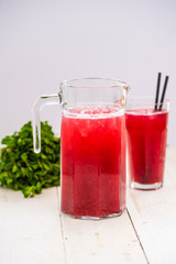 Strawberry juice. strawberry lemonade. White background. red drink.
