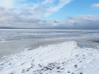 Naklejka na ściany i meble Ice on the lake in winter