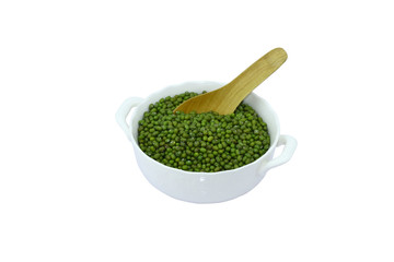 mung beans in ceramic bowl and wooden spoon isolated on white background