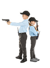 Cute little police officers on white background