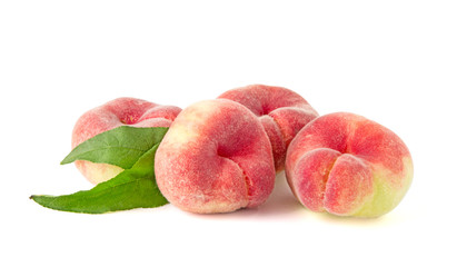 Fresh flat peach isolated on white background.