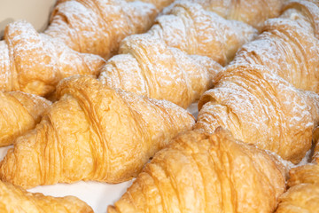 French croissant with icing on top