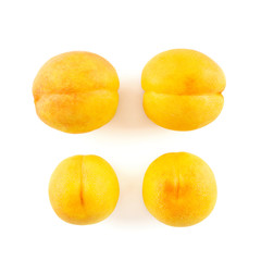 Fresh yellow peach isolated on white background.