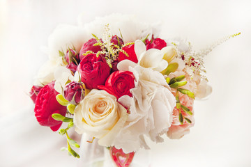 Beautiful tender bride's wedding bouquet made of peonies and alstromeries