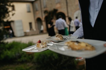 waiter serving dessert