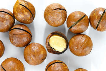 top view macadamia nuts on white