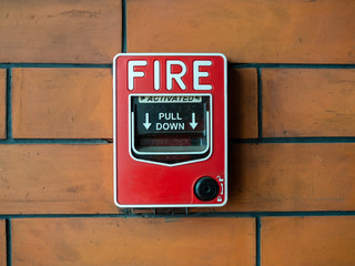 Red manual pull fire alarm safety system. Pull station or call point, manual fire alarm activation...