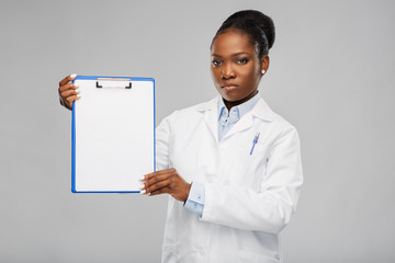 medicine, profession and healthcare concept - african american female doctor or scientist in white...
