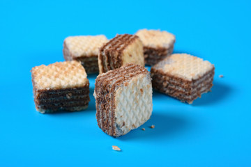 chocolate wafer blocks on a blue background