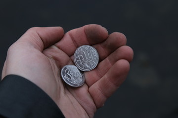 Antique silver coins of Kievan Rus on the palm