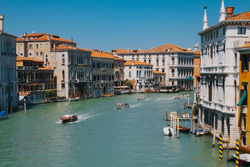 VENICE, ITALY -APRIL 8: Gondolas and tourists on April 8, 2011 in Venice, Italy. Venice has an average of 50,000 tourists a day and was the 26th most visited city in the world.