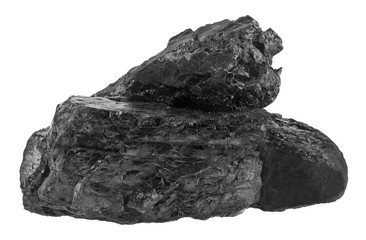 Pile of coal isolated on a white background close-up.