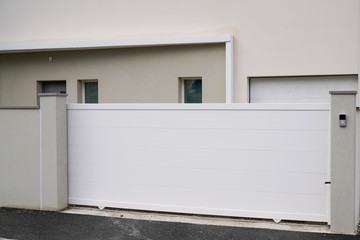 white door aluminum gate portal of suburb house
